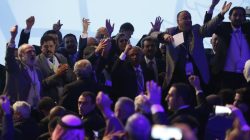 Participants react as they attend a session of the Syrian Congress of National Dialogue in the Black Sea resort of Sochi, Russia January 30, 2018.