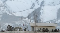 Afghan security forces take position on a roof of a building the site of a blast and gunfire between Taliban and Afghan forces in PD 6 in Kabul, Afghanistan March 1, 2017.