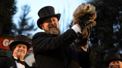 Groundhog co-handler A.J. Derume holds Punxsutawney Phil at Gobbler's Knob on the 132nd Groundhog Day in Punxsutawney, Pennsylvania, U.S. February 2, 2018. REUTERS/Alan Free