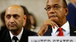 U.S. Ambassador Robert Wood (R) waits next to U.S. Army Captain Murzban Morris of the Departement of Defense Joint Staff before their address on North Korea to the Conference on Disarmament at the United Nations Office in Geneva, Switzerland August 30, 2017.