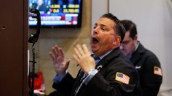 A trader reacts on the floor of the New York Stock Exchange in New York, U.S., February 6, 2018.