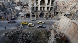 People and cars are seen in old town in Aleppo, Syria February 8, 2018.