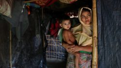 Rehana Khatun, whose husband Mohammed Nur was among 10 Rohingya men killed by Myanmar security forces and Buddhist villagers on September 2, 2017, poses for a picture with her child at Kutupalong camp in Cox's Bazar, Bangladesh, January 19, 2018. Picture taken January 19, 2018.