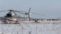 Russian Emergency Situations Ministry members work at the crash site of the short-haul AN-148 airplane operated by Saratov Airlines in Moscow Region, Russia February 12, 2018.