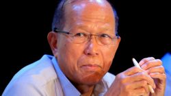 FILE PHOTO - Philippine Defence Secretary Delfin Lorenzana listens to questions during a news conference inside the military headquarters of Camp Aquinaldo in Quezon city, metro Manila, Philippines March 14, 2017