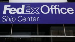 FILE PHOTO: A FedEx Office logo is pictured in Times Square in the Manhattan borough of New York, NY, U.S., April 2, 2017. REUTERS/Carlo Allegri/File Photo