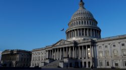 People walk by the U.S. Capitol building in Washington, U.S., February 8, 2018. REUTERS/ Leah Millis