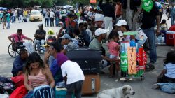 Venezuelans line the street at the border between Venezuela and Colombia, in Cucuta, Colombia February 21, 2018. REUTERS/Carlos Eduardo Ramirez