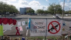 Messages, posted on a fence, hang, as students and parents attend a voluntary campus orientation at the Marjory Stoneman Douglas High School, for the coming Wednesday's reopening, following last week's mass shooting in Parkland, Florida, February 25, 2018. REUTERS/Angel Valentin