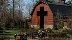 The casket is carried during the funeral service for U.S. evangelist Billy Graham at the Billy Graham Library in Charlotte, North Carolina, U.S., March 2, 2018. REUTERS/Chris Keane