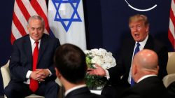 FILE PHOTO: U.S. President Donald Trump speaks with Israeli Prime Minister Benjamin Netanyahu during the World Economic Forum (WEF) annual meeting in Davos, Switzerland January 25, 2018. REUTERS/Carlos Ba