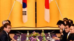 South Korea's National Intelligence Service chief Suh Hoon (L) and Japan's Foreign Minister Taro Kono (2-R) at the start of their meeting at the Iikura Guest House in Tokyo, Japan, 12 March 2018. REUTERS/Franck Robichon/Pool