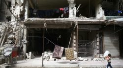 FILE PHOTO: A boy is seen in the besieged town of Douma, Eastern Ghouta, in Damascus, Syria March 8, 2018. REUTERS/Bassam Khabieh/File Photo