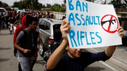 FILE PHOTO: Students from South Plantation High School carrying placards and shouting slogans walk on the street during a protest in support of the gun control, following a mass shooting at Marjory Stoneman Douglas High School, in Plantation, Florida, February 21, 2018. REUTERS/Carlos Garcia Rawlins/File Photo