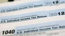 U.S. 1040 Individual Income Tax forms are seen in New York March 18, 2013. REUTERS/Shannon Stapleton
