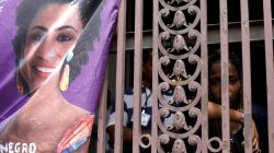 A woman reacts next to a picture of the Rio de Janeiro city councillor Marielle Franco, 38, who was shot dead, during a demonstration ahead of her wake outside the city council chamber in Rio de Janeiro, Brazil March 15, 2018. REUTERS/Ricardo Moraes