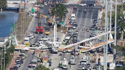 FILE PHOTO: Aerial view shows a pedestrian bridge collapsed at Florida International University in Miami, Florida, U.S., March 15, 2018. REUTERS/Joe Skipper/File Photo