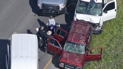 Law enforcement personnel investigate the scene where the Texas bombing suspect blew himself up on the side of a highway north of Austin in Round Rock, Texas, U.S., March 21, 2018. REUTERS/Loren E