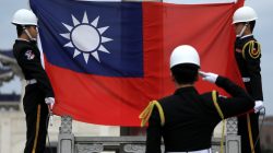 FILE PHTO: Military honour guards attend a flag-raising ceremony at Chiang Kai-shek Memorial Hall, in Taipei, Taiwan March 16, 2018. REUTERS/Tyrone Siu