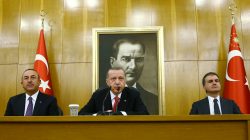 Turkish President Tayyip Erdogan, accompanied by Foreign Minister Mevlut Cavusoglu and Minister of European Union Affairs Omer Celik, speaks during a news conference at Ataturk International airport in Istanbul, Turkey March 26, 2018. Kayhan Ozer/Presidential Palace/Handout via REUTERS ATTENTION EDITORS - THIS PICTURE WAS PROVIDED BY A THIRD PARTY. NO RESALES. NO ARCHIVE.