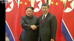 North Korean leader Kim Jong Un shakes hands with Chinese President Xi Jinping, in this still image taken from video released on March 28, 2018. North Korean leader Kim Jong Un visited China from Sunday to Wednesday on an unofficial visit, China's state news agency Xinhua reported on Wednesday. CCTV via Reuters TV