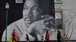 FILE PHOTO: People gather to march in the annual parade down MLK Boulevard to honor Martin Luther King, in Chattanooga, Tennessee, U.S., January 16, 2017. REUTERS/Billy Weeks