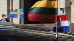 Ambassadors' cars with Lithuanian, Croatian and Swedish flags are parked near the Russian Foreign Ministry in Moscow, Russia March 30, 2018. REUTERS/Maxim Shemetov