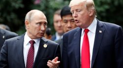U.S. President Donald Trump and Russia's President Vladimir Putin talk during the family photo session at the APEC Summit in Danang, Vietnam November 11, 2017. REUTERS/Jorge Silva