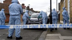 Forensic investigators examine a car on Chalgrove Road, where a teenage girl was murdered, in Tottenham, Britain, April 3, 2018. REUTERS/Toby Melville