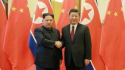 North Korean leader Kim Jong Un shakes hands with Chinese President Xi Jinping in Beijing, as he paid an unofficial visit to China, in this undated photo released by North Korea's Korean Central News Agency (KCNA) in Pyongyang March 28, 2018. KCNA/via Reuters