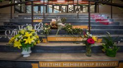 Community members leave notes and flowers at a memorial at Elgar Petersen Arena in Humboldt, April 7, 2018. REUTERS/Matt Smith