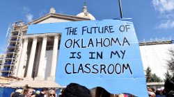 Teachers rally outside the state Capitol on the second day of a teacher walkout to demand higher pay and more funding for education in Oklahoma City, Oklahoma, U.S., April 3, 2018. REUTERS/Nick Oxford