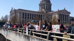 As their walk-out for higher wages and increased education spending enters its second week, teachers rally outside the Oklahoma Capitol in Oklahoma City, Oklahoma, U.S. April 9, 2018. REUTERS/Heide Brandes