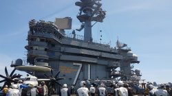 A busy day on the flight deck of the USS Theodore Roosevelt while transiting the South China Sea April 10, 2018. REUTERS/Karen Lema