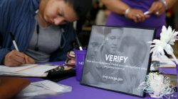 FILE PHOTO: South Cobb High School senior Fabiola Diaz, 18, carefully double-checks the details on her driver's license as she registers to vote during a registration drive by voting rights group New Project Georgia in Austell, Georgia, U.S. February 6, 2018. Picture taken February 6, 2018. REUTERS/Chris Aluka Berry