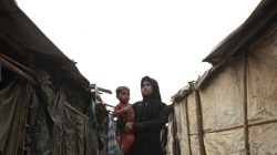 Rehana Khatun, whose husband Nur Mohammed was among 10 Rohingya men killed by Myanmar security forces and Buddhist villagers on September 2, 2017, poses for a picture with her child at Kutupalong camp in Cox's Bazar, Bangladesh, March 25, 2018. Picture taken March 25, 2018. REUTERS/Mohammad Ponir Hossain