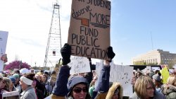 Teachers rally outside the state Capitol on the second day of a teacher walkout to demand higher pay and more funding for education in Oklahoma City, Oklahoma, U.S., April 3, 2018. REUTERS/Nick Oxford