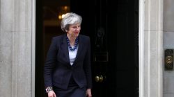 Britain's Prime Minister Theresa May walks out of 10 Downing Street to greet Portugal's Prime Minister Antonio Costa in London, April 10, 2018. REUTERS/Hannah Mckay