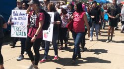 Protester march during a strike by Oklahoma educators demanding more school funding near the Oklahoma state Capitol in Oklahoma City, Oklahoma, U.S., April 9, 2018. Picture taken on April 9, 2018. REUTERS/Heide Brandes