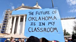 FILE PHOTO: Teachers rally outside the state Capitol on the second day of a teacher walkout to demand higher pay and more funding for education in Oklahoma City, Oklahoma, U.S., April 3, 2018. REUTERS/Nick Oxford/File Photo