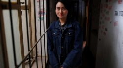 Li Wenzu, wife of detained Chinese rights lawyer Wang Quanzhang, poses for a picture in Beijing, April 12, 2018. REUTERS/Damir Sagolj