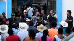 Policemen guard a crime scene where mayoral candidate Santana Cruz Bahena was gunned down at his home in the municipality of Hidalgotitlan, in the state of Veracruz, Mexico November 20, 2017. REUTERS/Angel Hernandez