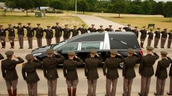 The hearse carrying former first lady Barbara Bush passes through members of the Texas A&M Corps of Cadets as it nears her husband's presidential library at the university in College Station, Texas, U.S. April 21, 2018. Smiley N. Pool/Pool via REUTERS
