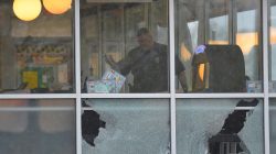 FILE PHOTO: Metro Davidson County Police inspect the scene of a fatal shooting at a Waffle House restaurant near Nashville, Tennessee, U.S., April 22, 2018. REUTERS/Harrison McClary
