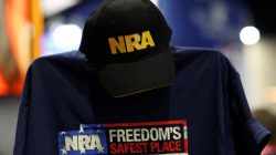 A cap and shirt are displayed at the booth for the National Rifle Association (NRA) at the Conservative Political Action Conference (CPAC) at National Harbor, Maryland, U.S., February 23, 2018. REUTERS/Joshua Roberts