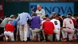 FILE PHOTO: Patrick Conroy, Chaplain of the House of Representatives, leads Democrats and Republicans in prayer before they face off in the annual Congressional Baseball Game at Nationals Park in Washington, U.S., June 15, 2017. REUTERS/Joshua Roberts