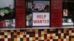 A help wanted sign is posted at a taco stand in Solana Beach, California, U.S., July 17, 2017. REUTERS/Mike Blake