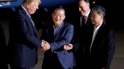 U.S.President Donald Trump greets the Americans formerly held hostage in North Korea upon their arrival at Joint Base Andrews, Maryland, U.S., May 10, 2018. REUTERS/Joshua Roberts