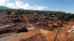 An aerial view of rescue efforts near destroyed houses by flooding water after a dam burst, in Solio town near Nakuru, Kenya May 10, 2018. REUTERS/Thomas Mukoya