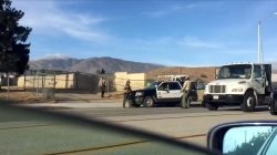 Police vehicles are seen on the road near Highland High School, in Palmdale, California, U.S., May 11, 2018 in this picture grab obtained from social media video. MELENDEZ N JUNIOR/via REUTERS